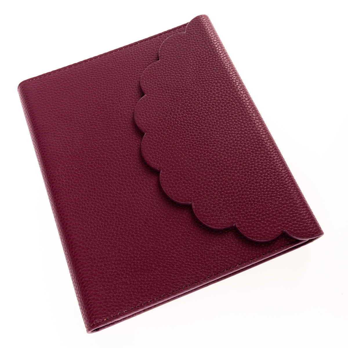 Burgundy Vegan Leather Wrap Journal, A burgundy vegan leather wrap journal with a scalloped flap and pebbled texture, shown open with its spiral insert and pen loop.