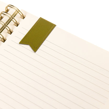 Olive Green Fabric-Bound Task Journal, An olive green fabric task journal with Daily Overview lettered in gold foil down the spine edge.