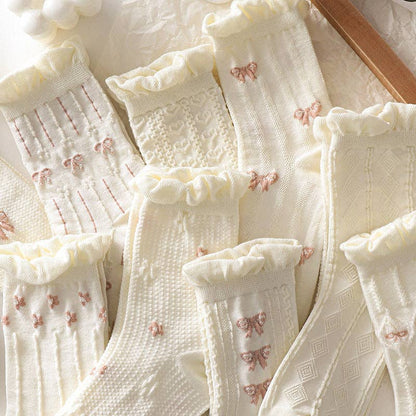 Calcetines blancos con borde enrollado para mujer
