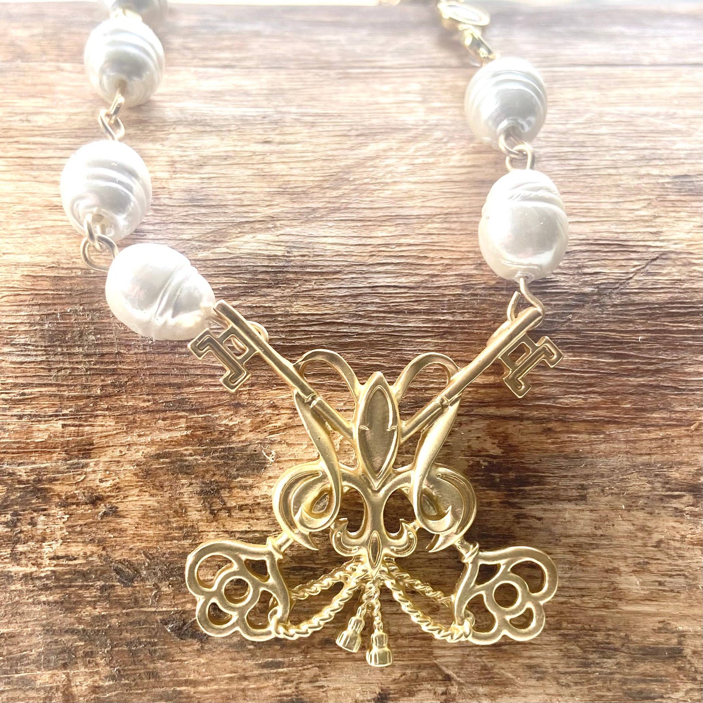 Fleur de lis French matte gold pearl necklace