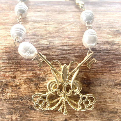 Fleur de lis French matte gold pearl necklace