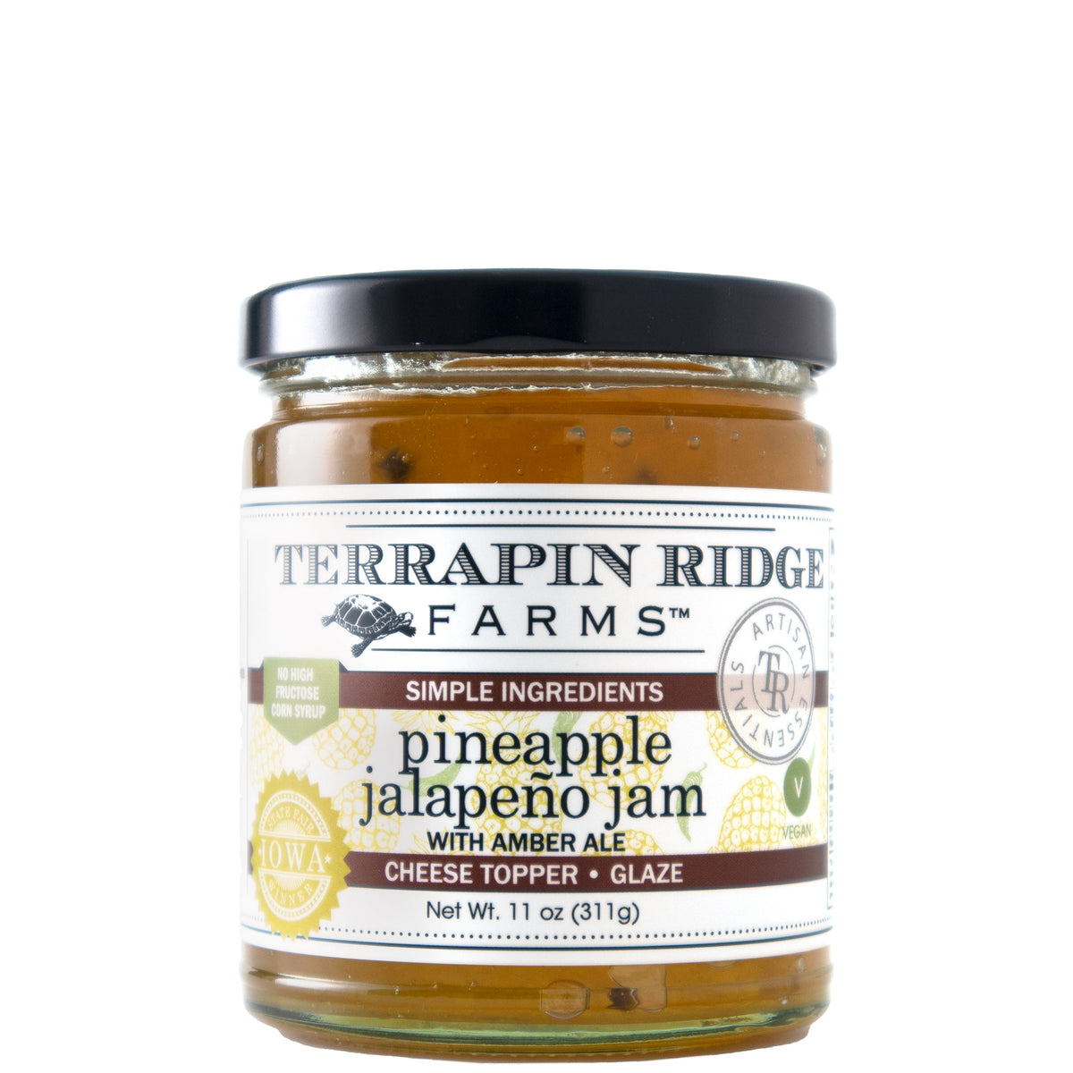 A glass jar of golden Terrapin Ridge Farms pineapple jalapeno jam with amber ale, with a black lid and a label reading net wt. 11 oz.