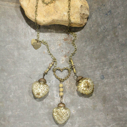 Collar retro de oro viejo "Tres veces el amor"