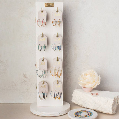 Narrow White Spinning Counter Display