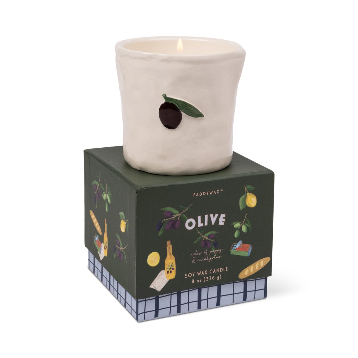 Fig & Olive Bistro Candle 8 oz, A lit ceramic candle with a hand-painted olive and leaf stands on its green Fig and Olive box.