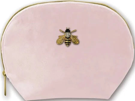 Necesser de maquillaje de terciopelo rosa con abeja.