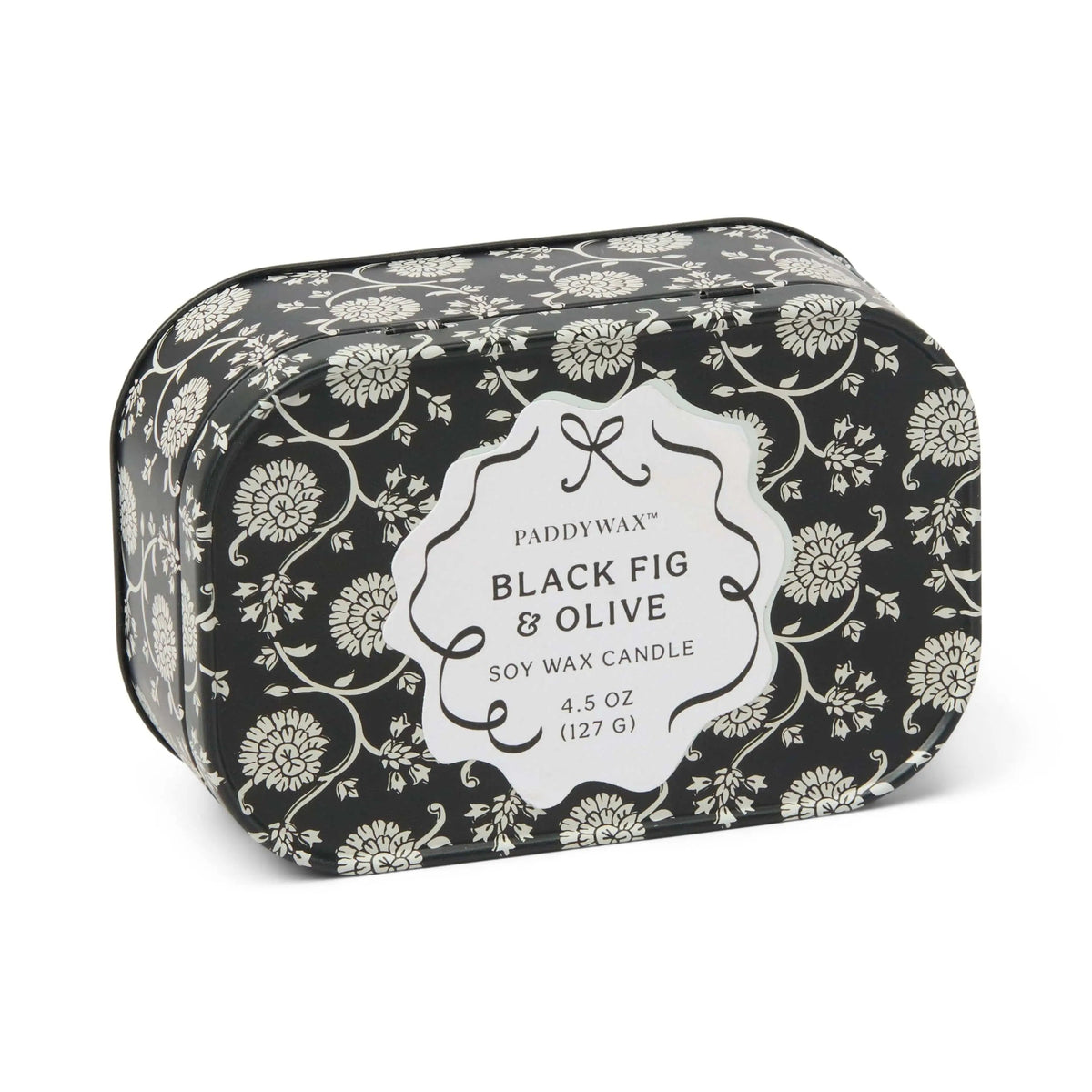 Chérie 4.5 oz Tin Candle, A black metal tin printed with a cream floral pattern, labeled Black Fig and Olive Soy Wax Candle.