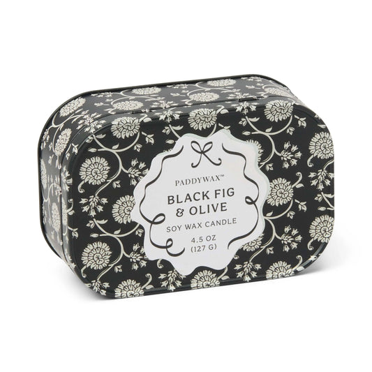 Chérie 4.5 oz Tin Candle, A black metal tin printed with a cream floral pattern, labeled Black Fig and Olive Soy Wax Candle.