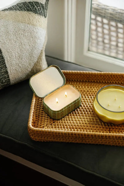Chérie 4.5 oz Tin Candle, A black metal tin printed with a cream floral pattern, labeled Black Fig and Olive Soy Wax Candle.