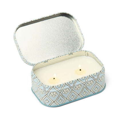 Chérie 4.5 oz Tin Candle, A black metal tin printed with a cream floral pattern, labeled Black Fig and Olive Soy Wax Candle.