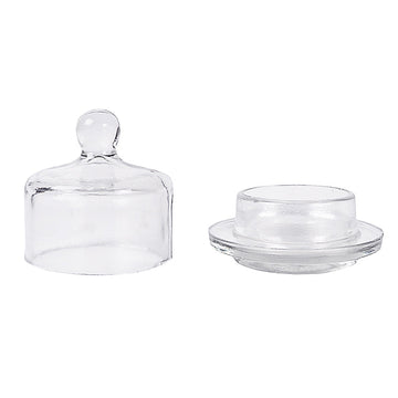 Lucent Glass Butter Dish, A clear glass butter dish with its domed lid removed and set beside the round base, on a white background.