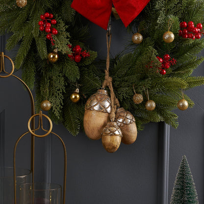 Wooden Acorn Ornament, Set of 3 Sizes with Silver Cupped Caps, Three wooden acorn ornaments of graduated sizes with silver leafed caps and jute hanging loops, arranged together against a white background.