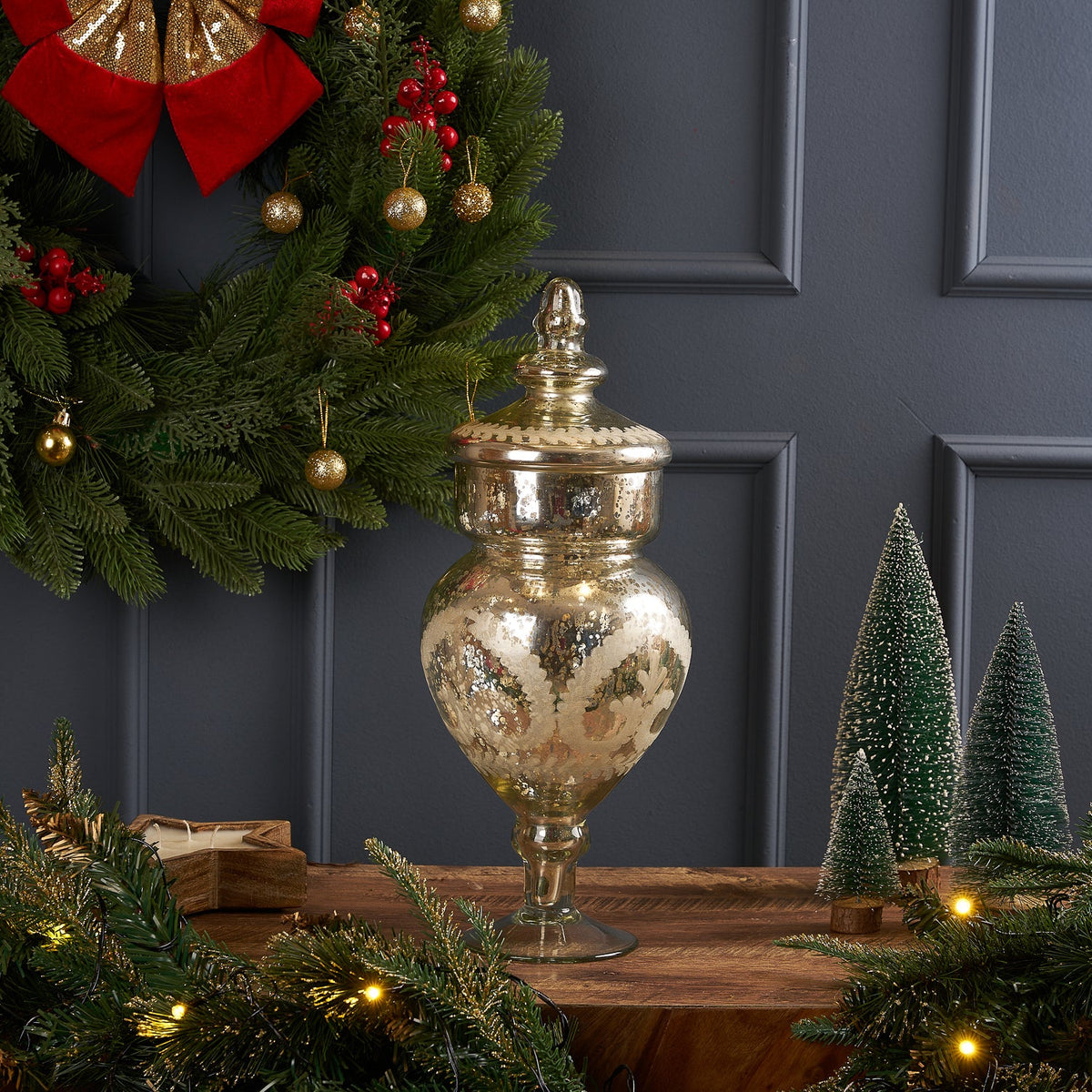 Sparkle Mercury Glass Trophy Jar with Lid, A tall mercury glass trophy-shaped jar with a mottled antique silver finish, its domed lid topped with a pointed finial, shown against a white background.