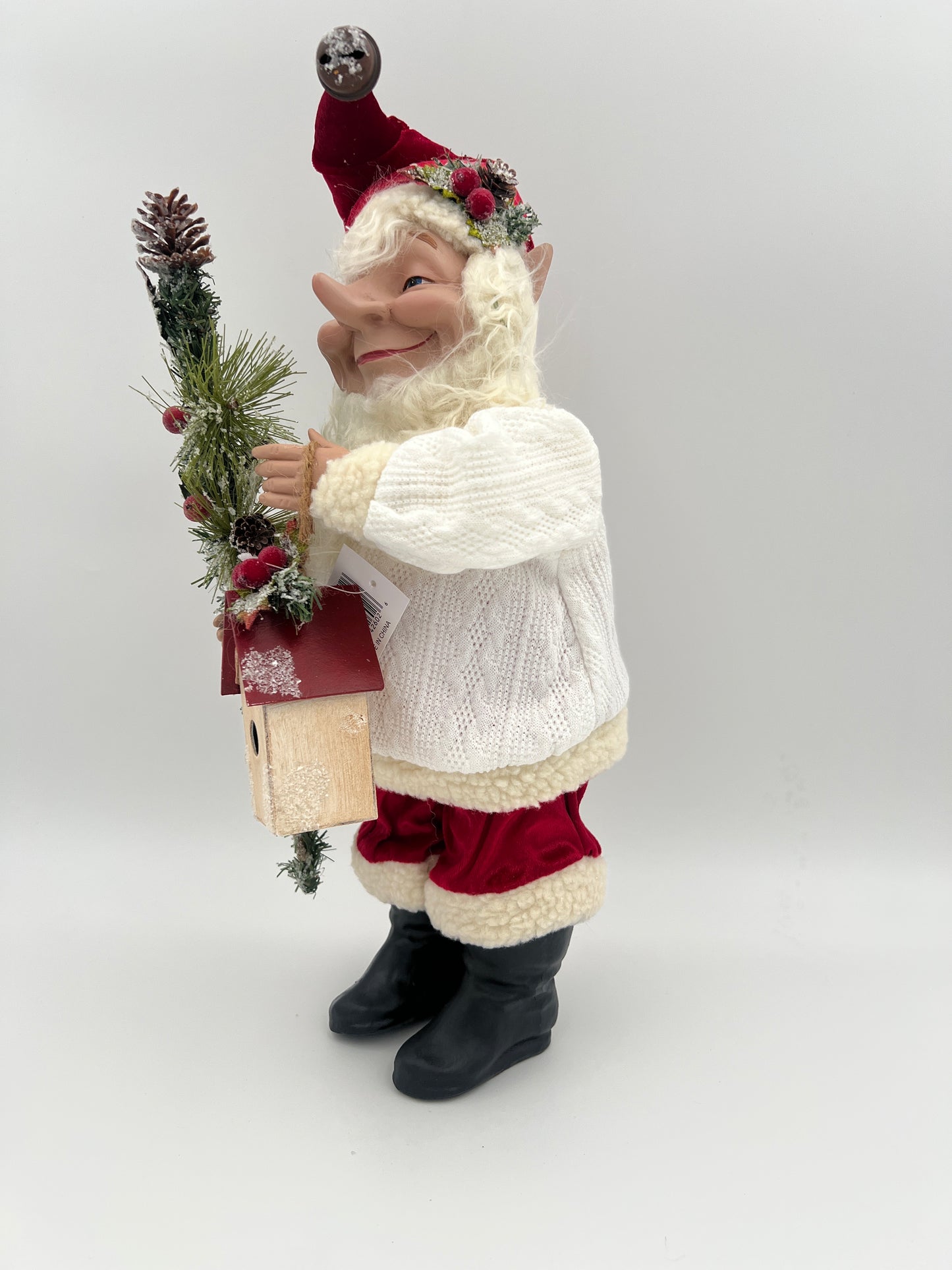 Papá Noel de 21" con suéter blanco y pantalones rojos sosteniendo una pajarera