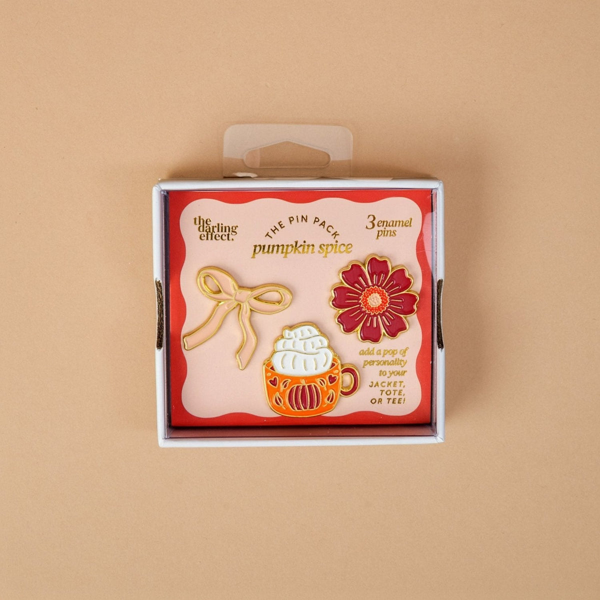 Enamel Pin Pack, A boxed set of three gold enamel pins in the Latte Love design, a coffee cup, a teddy bear, and a pink bow.