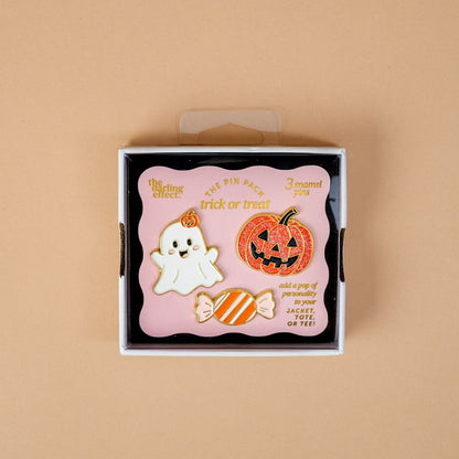 Enamel Pin Pack, A boxed set of three gold enamel pins in the Latte Love design, a coffee cup, a teddy bear, and a pink bow.