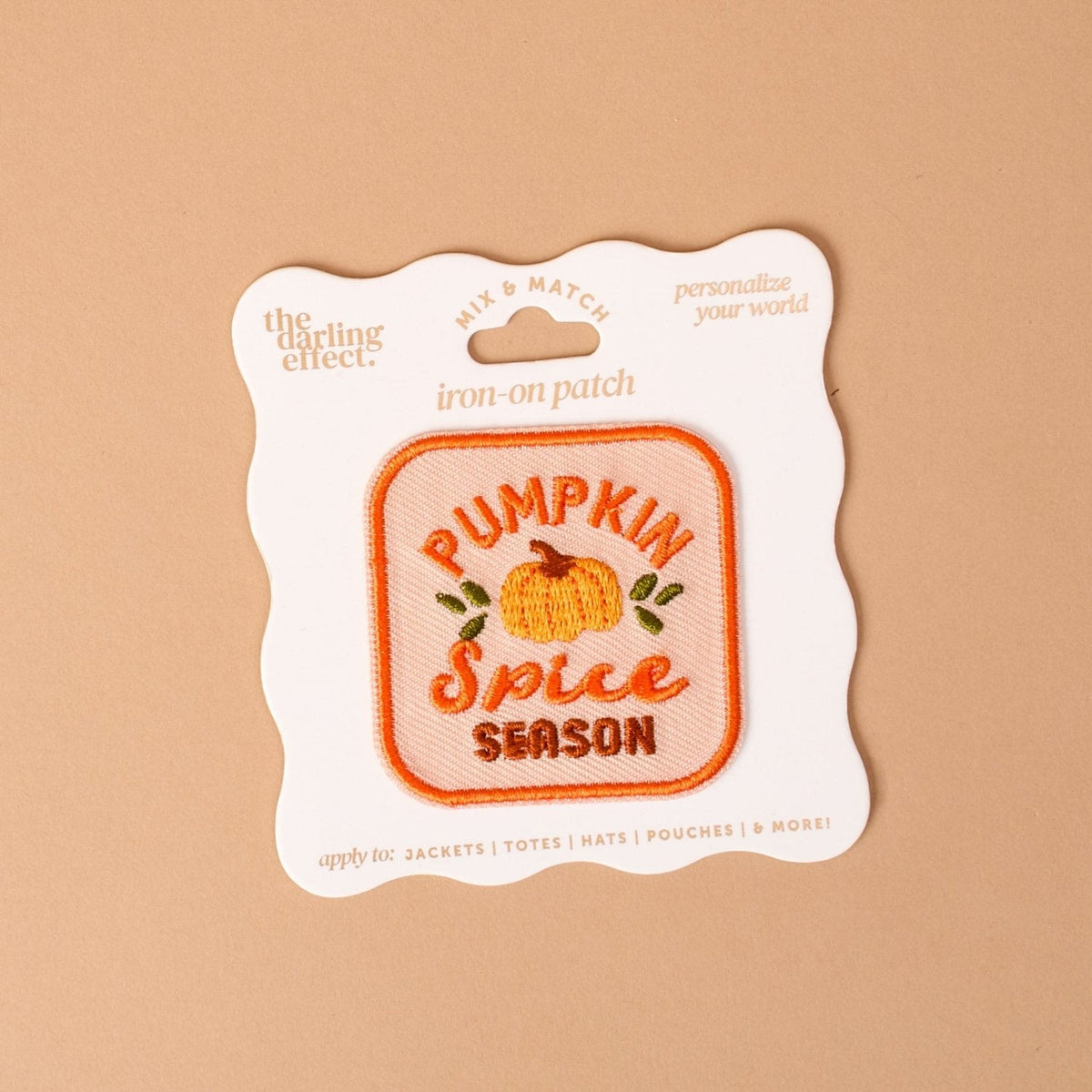 Mix & Match Iron-On Patch, A pink Be Kind patch on its patch card, with BE KIND spelled out in bold pink lettering.