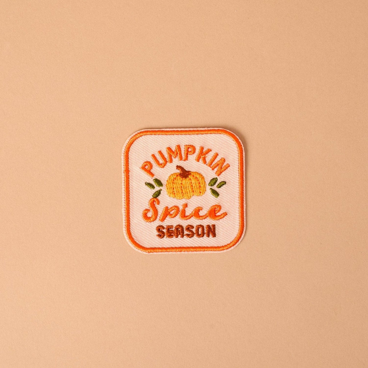 Mix & Match Iron-On Patch, A pink Be Kind patch on its patch card, with BE KIND spelled out in bold pink lettering.