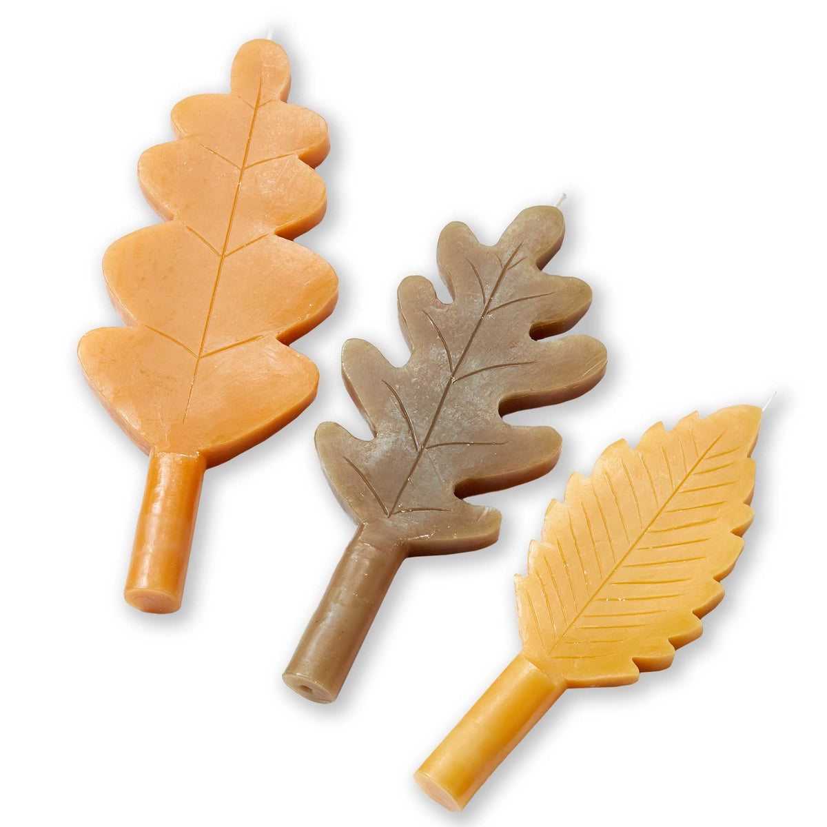 Fall Leaf Taper Set of Three, Photo shows three taper candles shaped like leaves in orange, brown, and gold, each with a raised vein pattern.