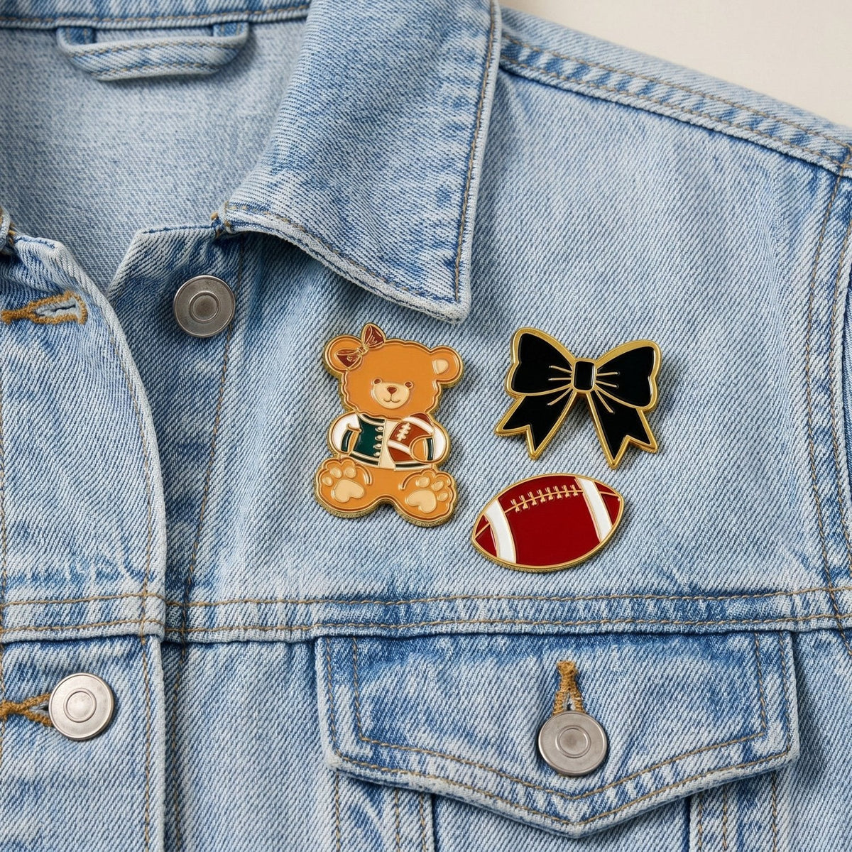 Enamel Pin Pack, A boxed set of three gold enamel pins in the Latte Love design, a coffee cup, a teddy bear, and a pink bow.