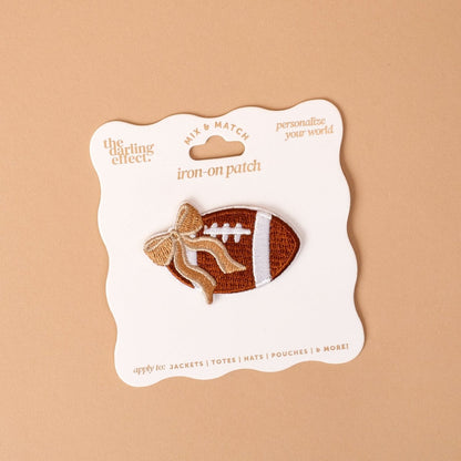 Mix & Match Iron-On Patch, A pink Be Kind patch on its patch card, with BE KIND spelled out in bold pink lettering.
