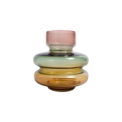 Scabiosa Tiered Glass Vase, A tiered glass vase with a pink neck, a rounded green middle band, and a wider amber base, on a white background.