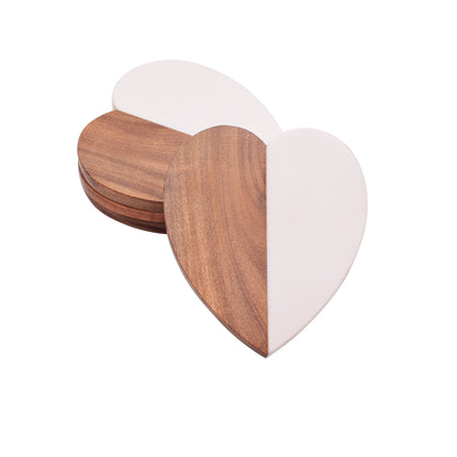 Zara Heart Coaster, A heart-shaped coaster, half natural wood and half white resin, stood upright to show the wood-and-resin split.