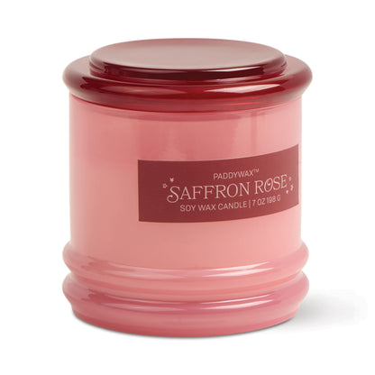 Stack 7 oz Candle, A blush pink glass candle with a maroon stacking lid, labeled Saffron Rose Soy Wax Candle, 7 oz.