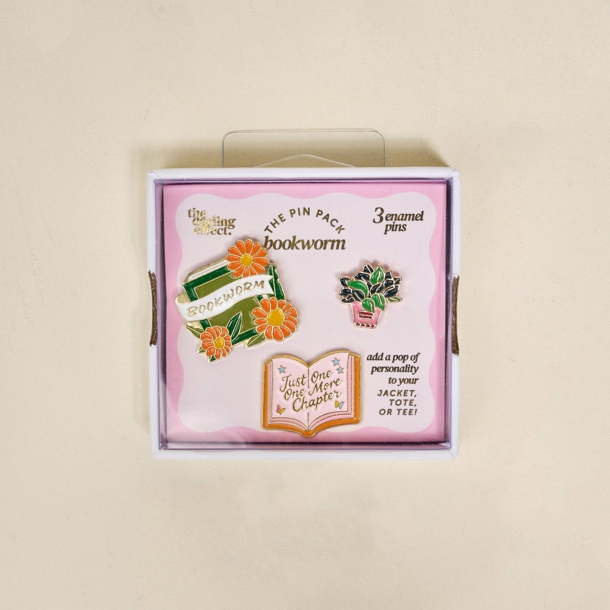 Enamel Pin Pack, A boxed set of three gold enamel pins in the Latte Love design, a coffee cup, a teddy bear, and a pink bow.
