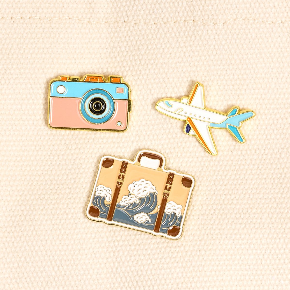 Enamel Pin Pack, A boxed set of three gold enamel pins in the Latte Love design, a coffee cup, a teddy bear, and a pink bow.