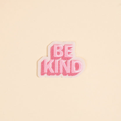 Mix & Match Iron-On Patch, A pink Be Kind patch on its patch card, with BE KIND spelled out in bold pink lettering.