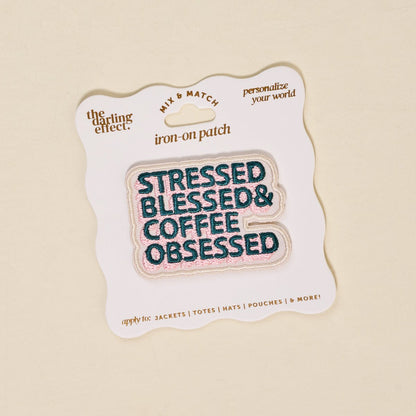 Mix & Match Iron-On Patch, A pink Be Kind patch on its patch card, with BE KIND spelled out in bold pink lettering.