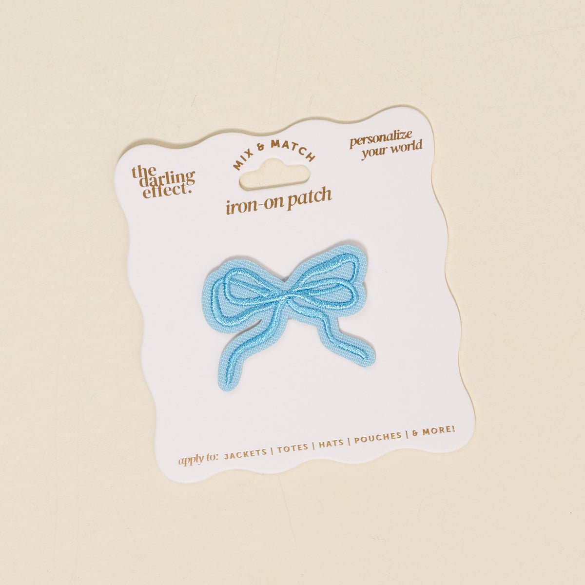 Mix & Match Iron-On Patch, A pink Be Kind patch on its patch card, with BE KIND spelled out in bold pink lettering.