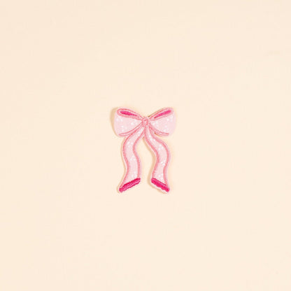Mix & Match Iron-On Patch, A pink Be Kind patch on its patch card, with BE KIND spelled out in bold pink lettering.