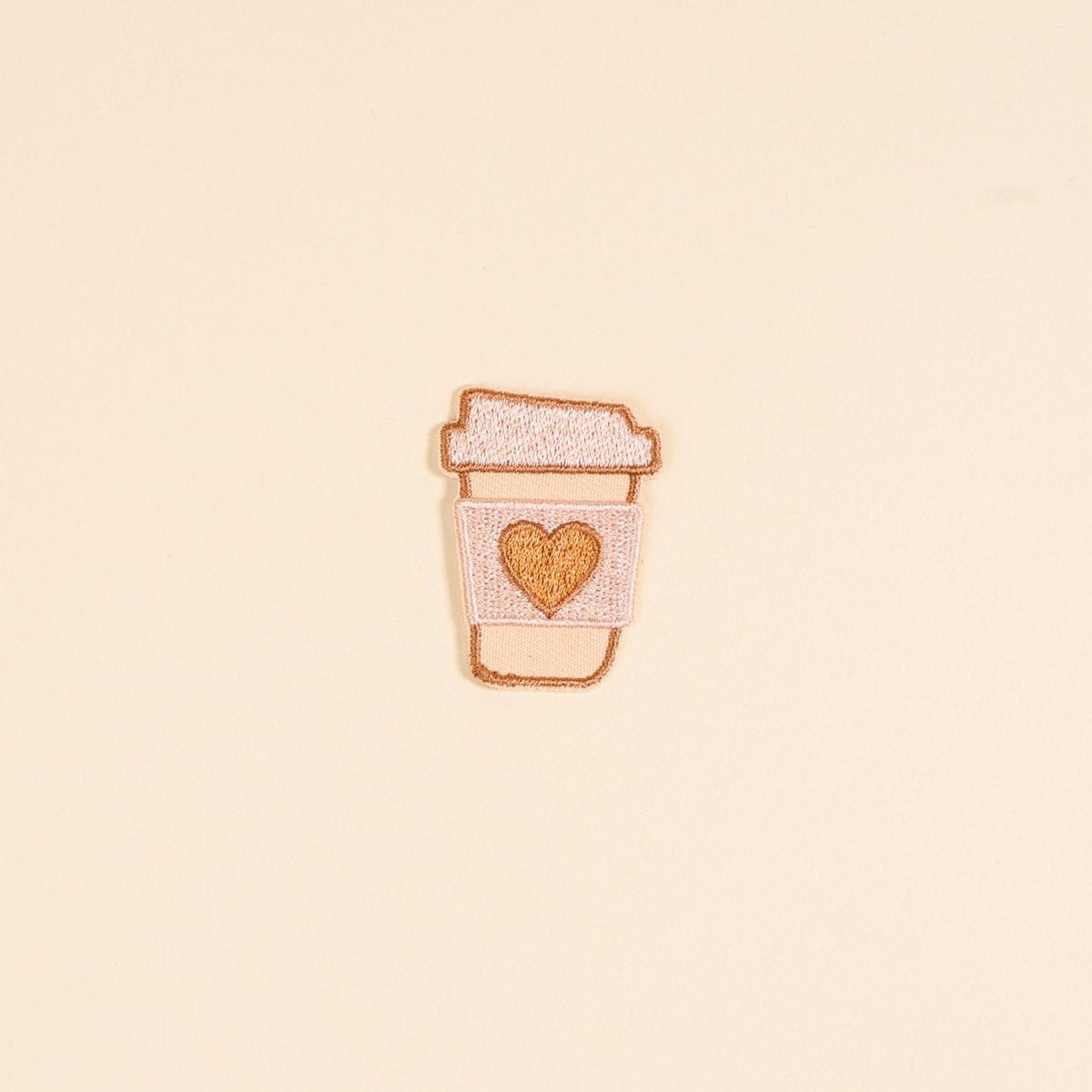 Mix & Match Iron-On Patch, A pink Be Kind patch on its patch card, with BE KIND spelled out in bold pink lettering.