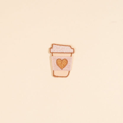 Mix & Match Iron-On Patch, A pink Be Kind patch on its patch card, with BE KIND spelled out in bold pink lettering.