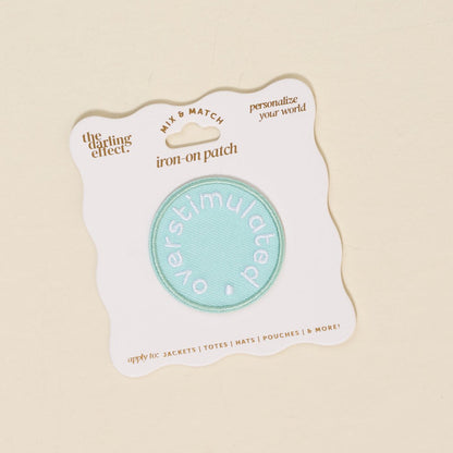 Mix & Match Iron-On Patch, A pink Be Kind patch on its patch card, with BE KIND spelled out in bold pink lettering.