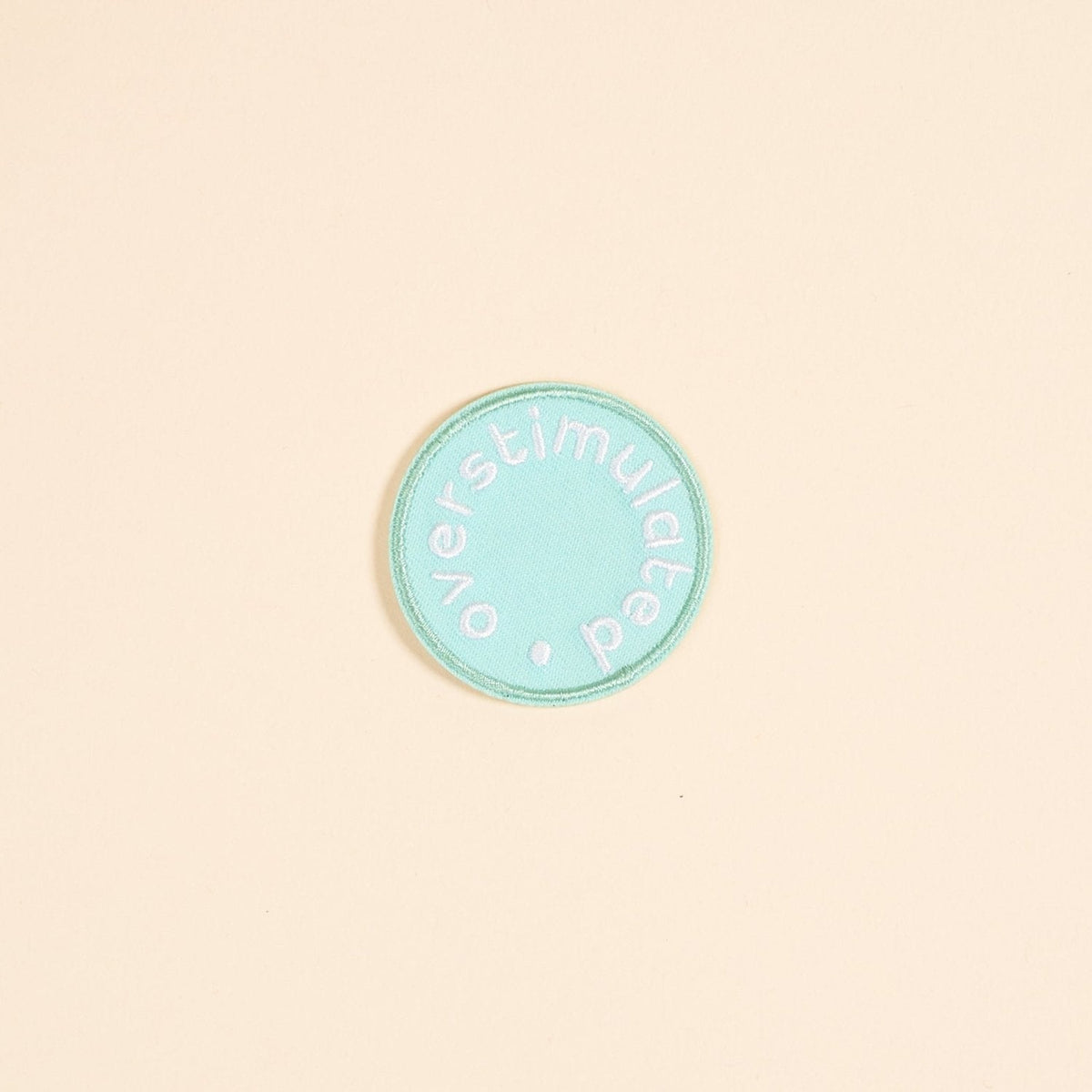 Mix & Match Iron-On Patch, A pink Be Kind patch on its patch card, with BE KIND spelled out in bold pink lettering.