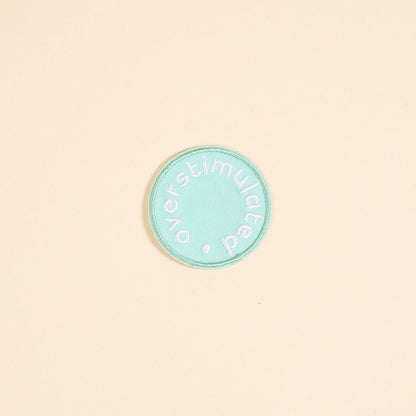 Mix & Match Iron-On Patch, A pink Be Kind patch on its patch card, with BE KIND spelled out in bold pink lettering.