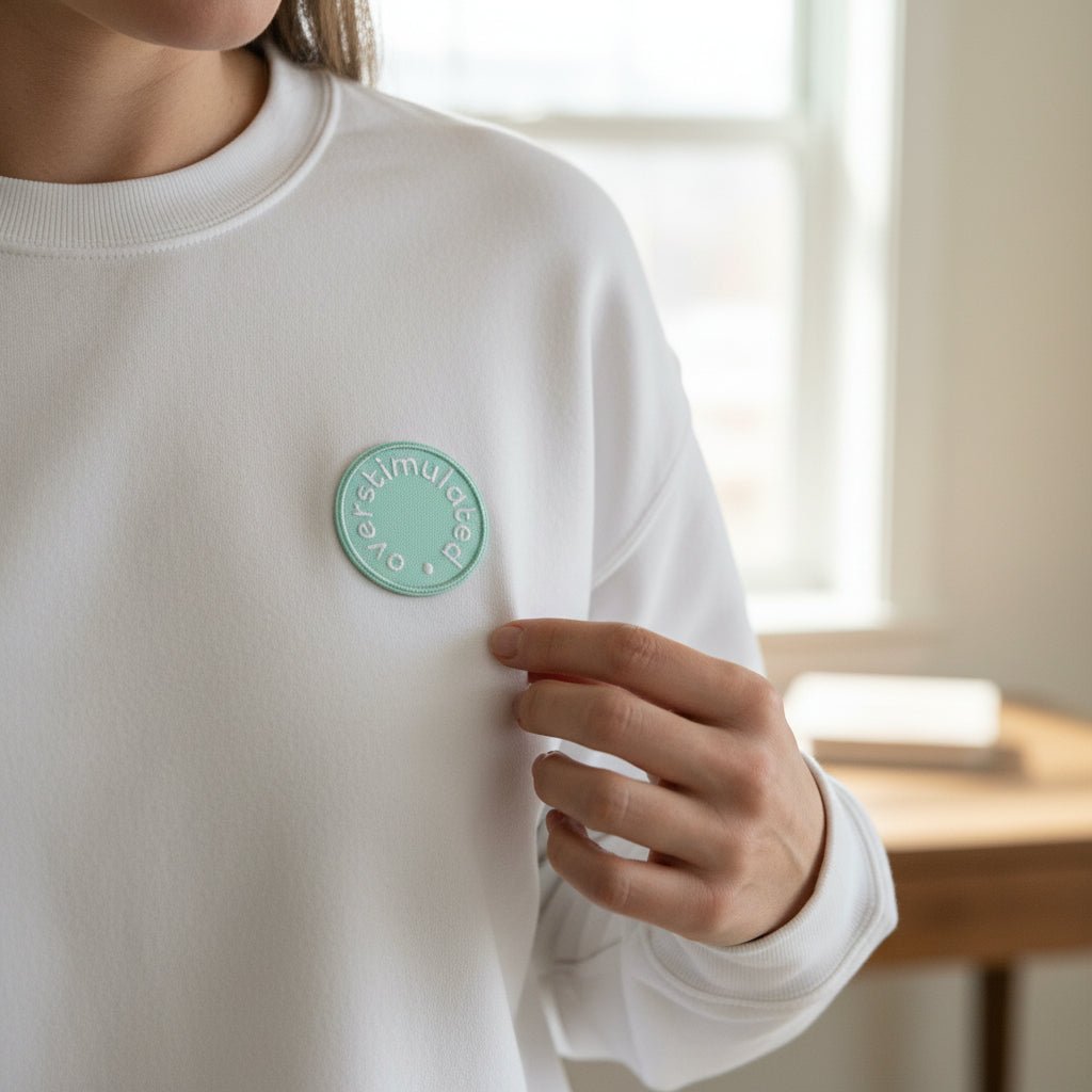 Mix & Match Iron-On Patch, A pink Be Kind patch on its patch card, with BE KIND spelled out in bold pink lettering.