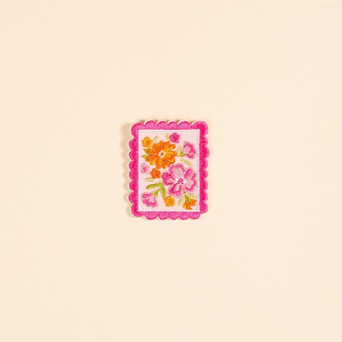 Mix & Match Iron-On Patch, A pink Be Kind patch on its patch card, with BE KIND spelled out in bold pink lettering.