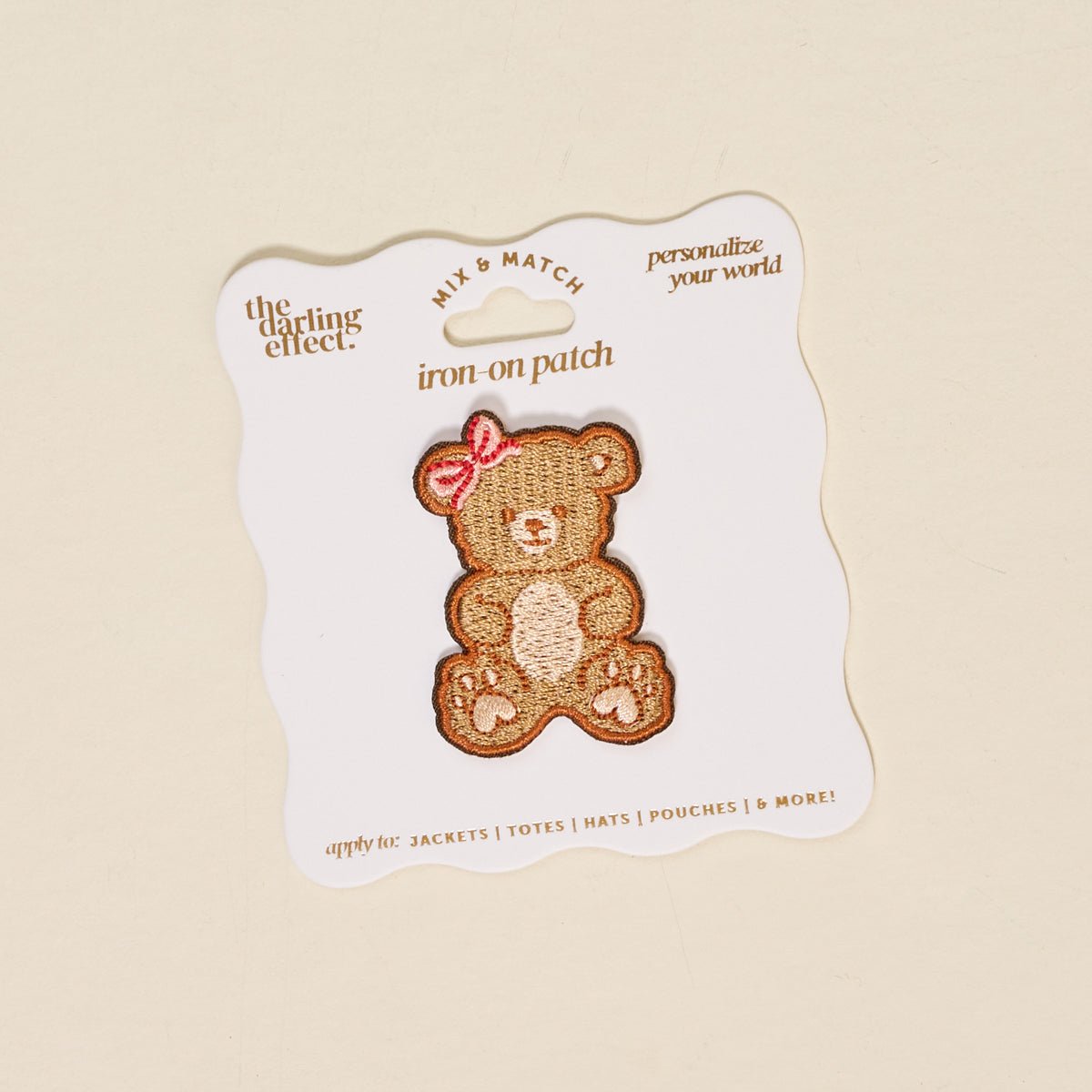 Mix & Match Iron-On Patch, A pink Be Kind patch on its patch card, with BE KIND spelled out in bold pink lettering.