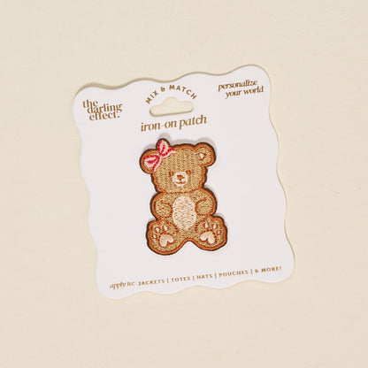 Mix & Match Iron-On Patch, A pink Be Kind patch on its patch card, with BE KIND spelled out in bold pink lettering.
