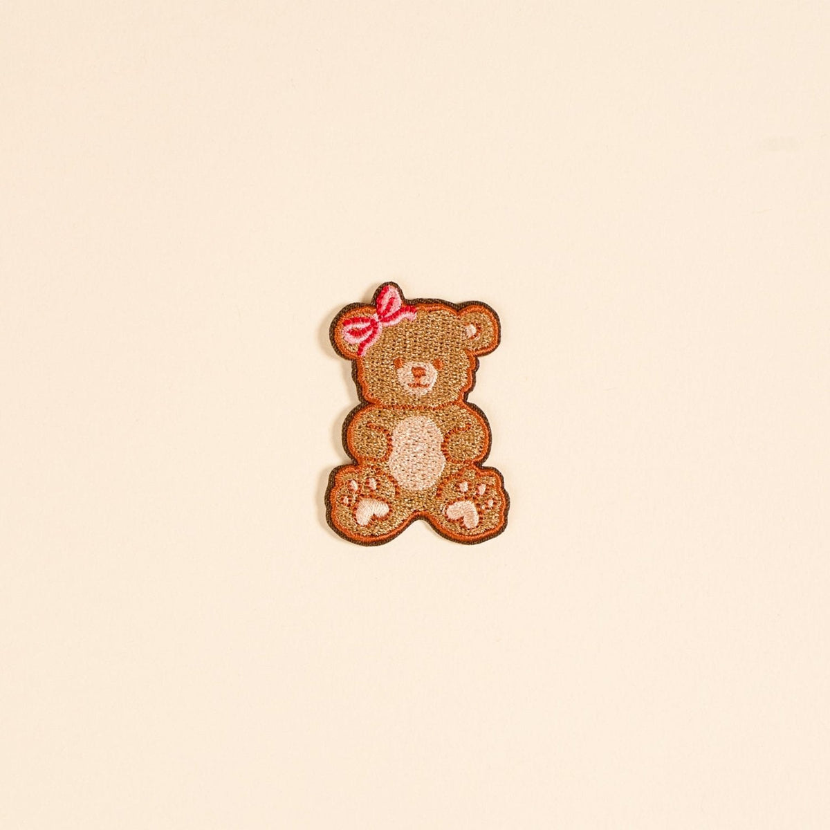 Mix & Match Iron-On Patch, A pink Be Kind patch on its patch card, with BE KIND spelled out in bold pink lettering.