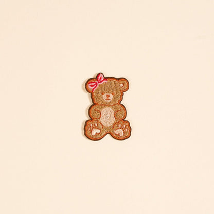Mix & Match Iron-On Patch, A pink Be Kind patch on its patch card, with BE KIND spelled out in bold pink lettering.