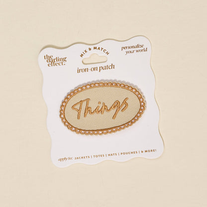 Mix & Match Iron-On Patch, A pink Be Kind patch on its patch card, with BE KIND spelled out in bold pink lettering.