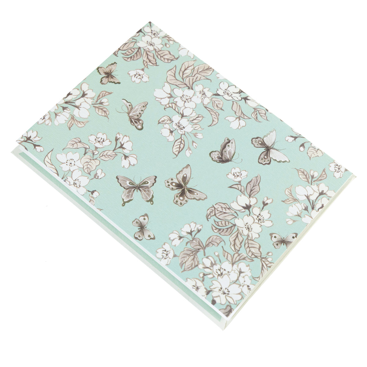 La Petite Presse Butterflies Boxed Correspondence Notes, A brown gift box open to reveal a seafoam green notecard with silver-foiled butterflies and cherry blossoms, paired with a matching mint envelope.