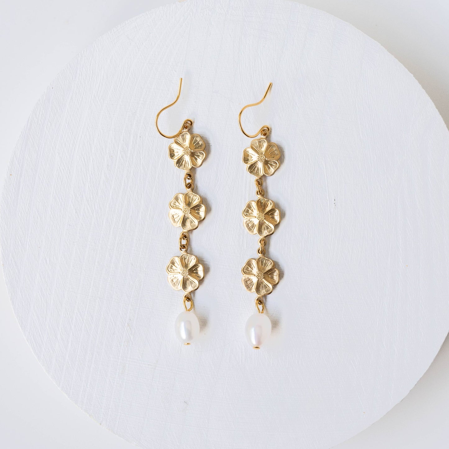 Pearl and three flowers dangle earrings