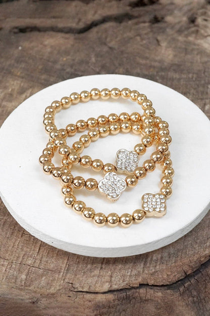 Pulsera de cuentas de bolas en tono dorado con diseño de trébol de cristal (pila de 3 pulseras)