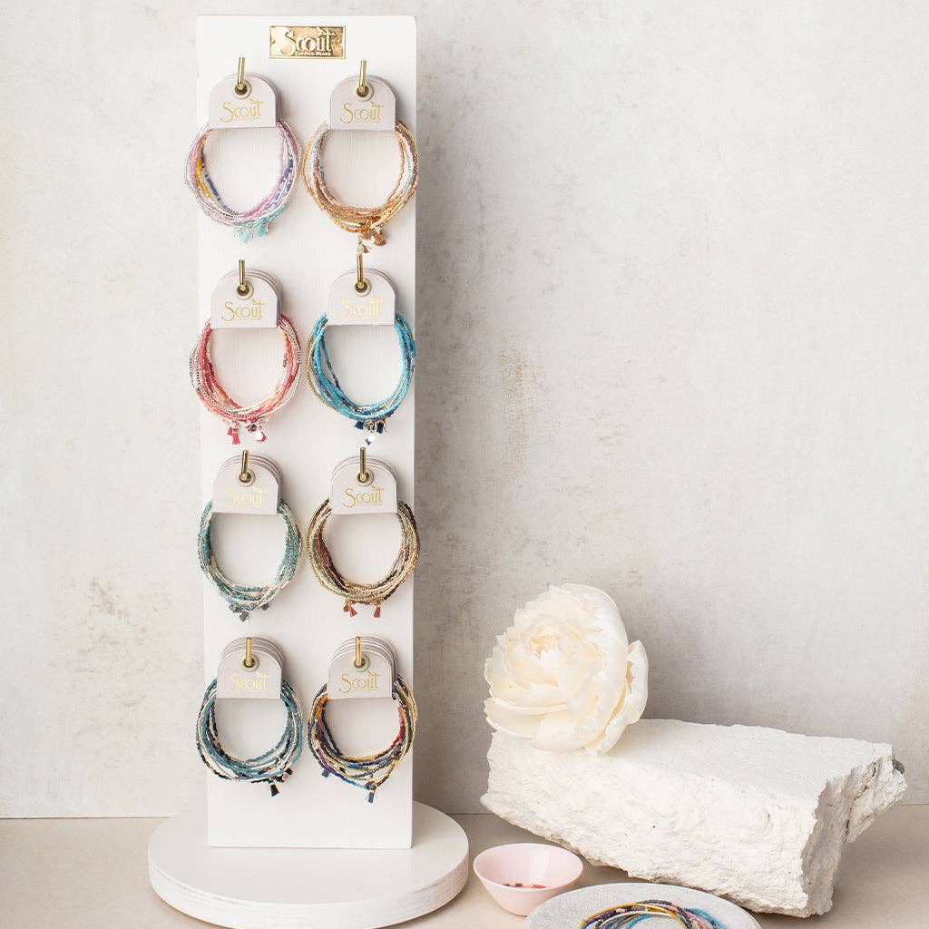Narrow White Spinning Counter Display